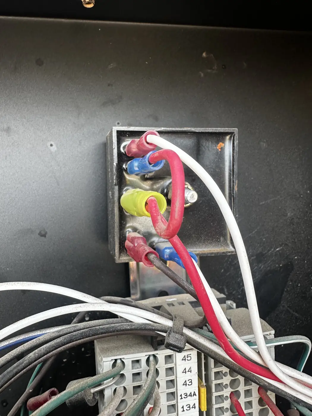 Time-delay relay wiring inside the ground controls of a Genie S-45