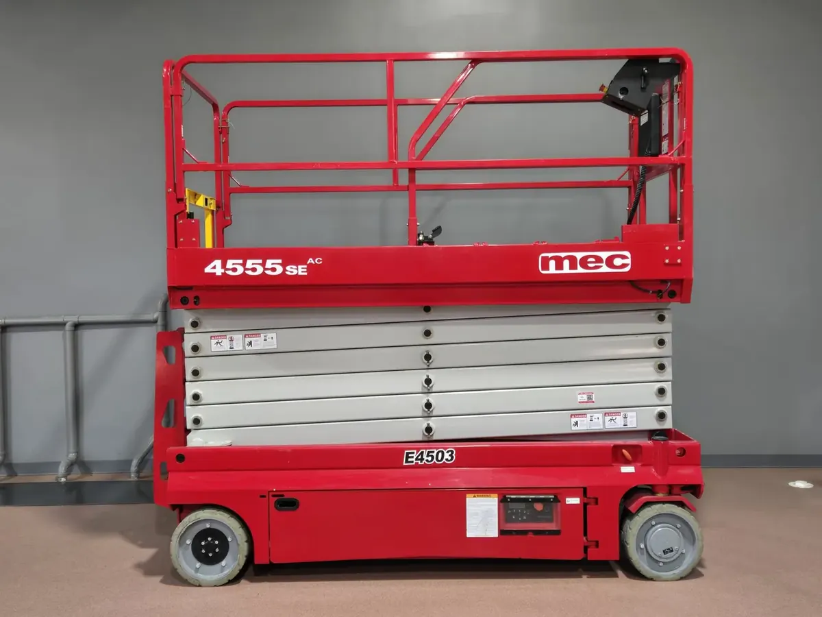 Red MEC scissor lift in Mondak Equipment inventory